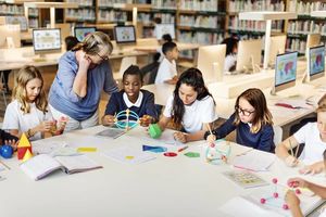 depositphotos 105315582 stock photo children studying in library